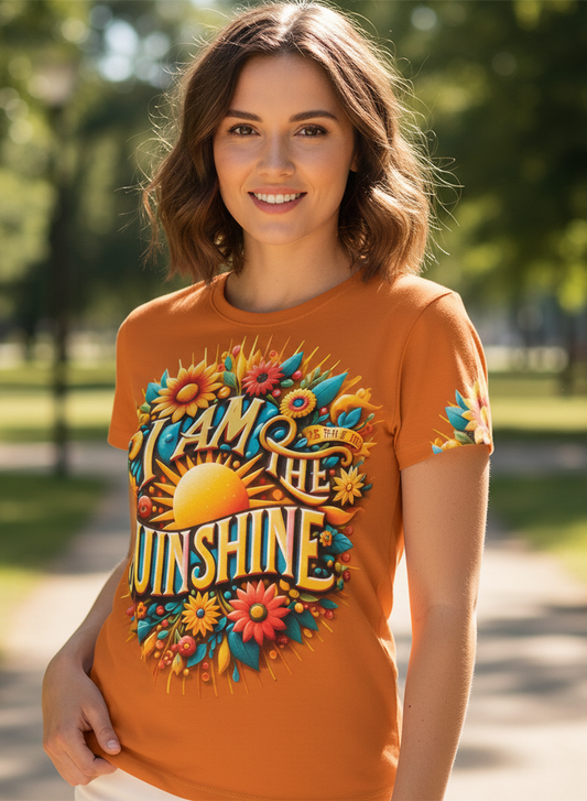 Women’s orange T-shirt with "I Am the Sunshine" motivational slogan by I Love Me Vibe, casual fit, front view.