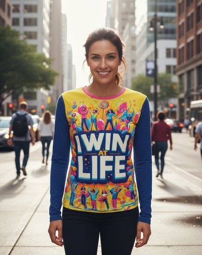 Women's long sleeve T-shirt by I Love Me Vibe with positive affirmation "I Win at Life" printed on the front.