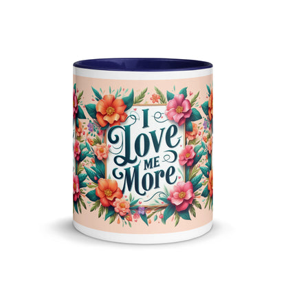 Dark blue I Love Me More affirmation mug with colorful inside, self-love motivational drinkware from I Love Me Vibe.