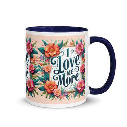 Dark blue I Love Me More affirmation mug with colorful inside, featuring motivational self-love message from I Love Me Vibe.