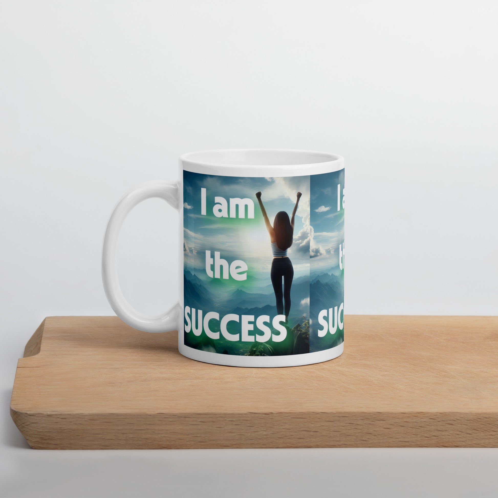 White glossy mug with "I Am The Success" affirmation from I Love Me Vibe, designed for empowering daily mindset.