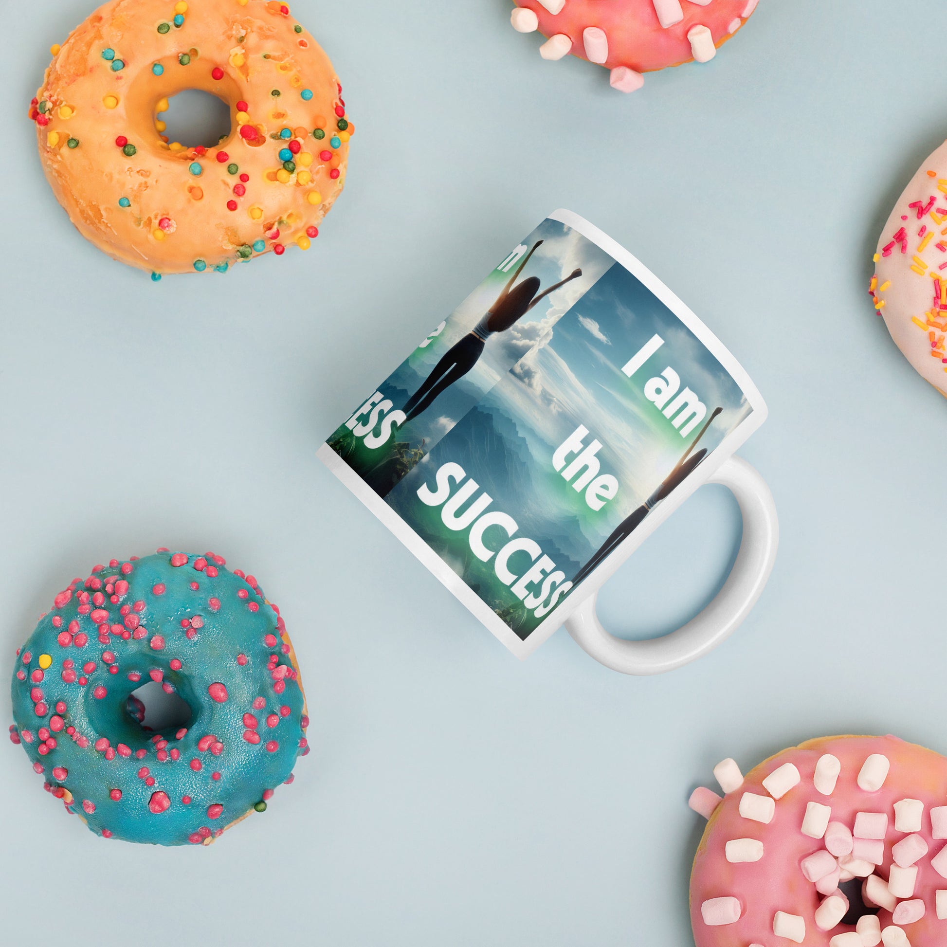 White glossy mug with "I Am The Success" affirmation text, empowering daily mindset drinkware from I Love Me Vibe.