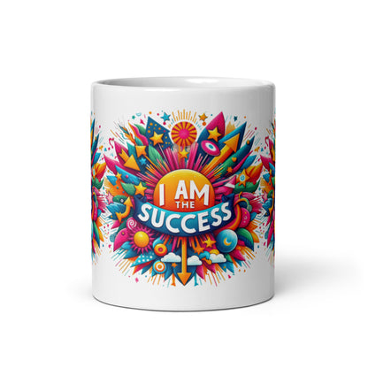 White glossy mug with "I Am The Success" affirmation, featuring motivational text and the I Love Me Vibe brand logo.