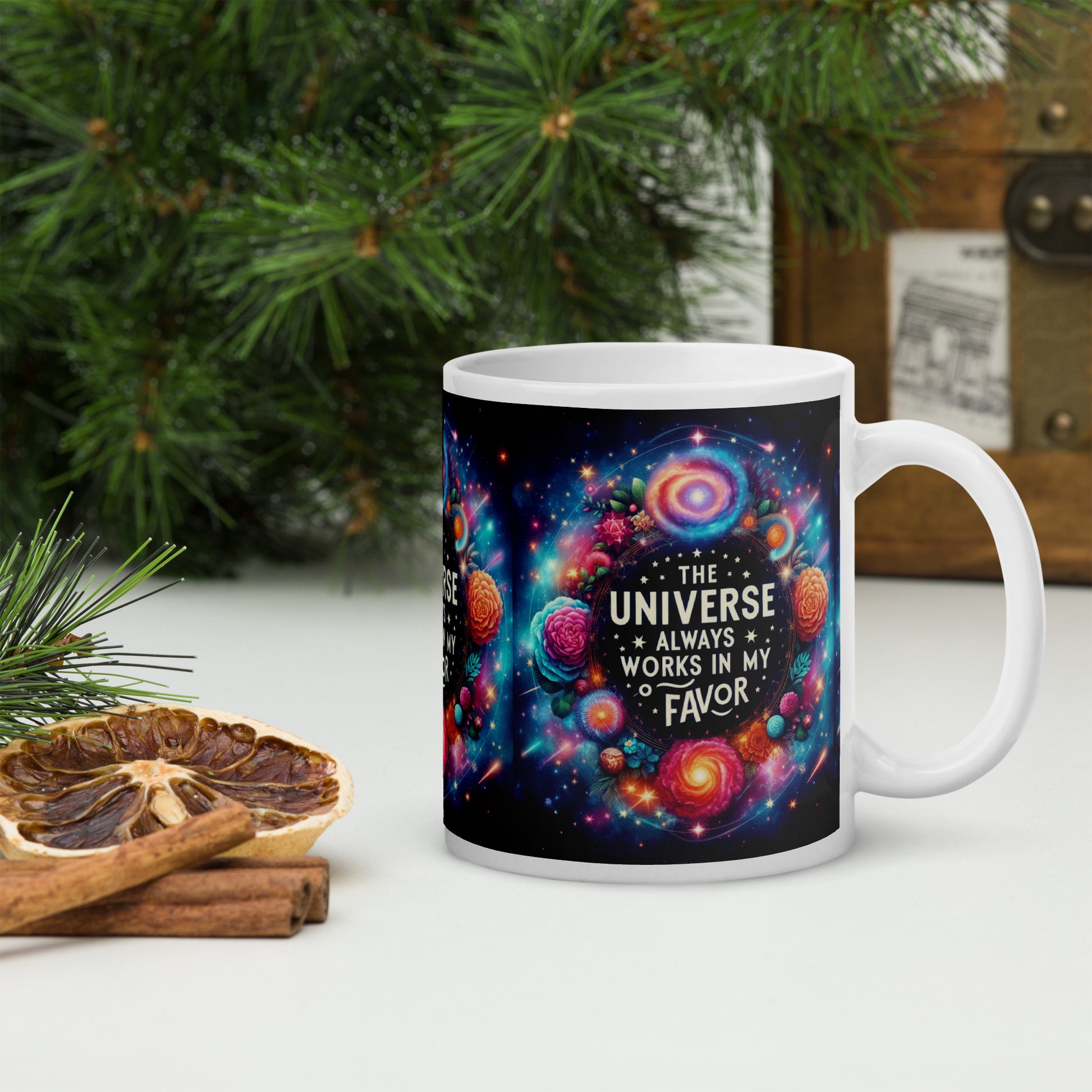 White glossy mug with "The Universe Always Works in My Favour" affirmation, I Love Me Vibe branding, perfect for alignment and manifestation.